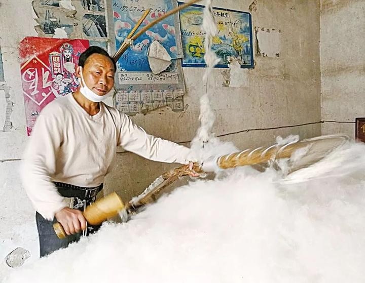 弹毛匠人